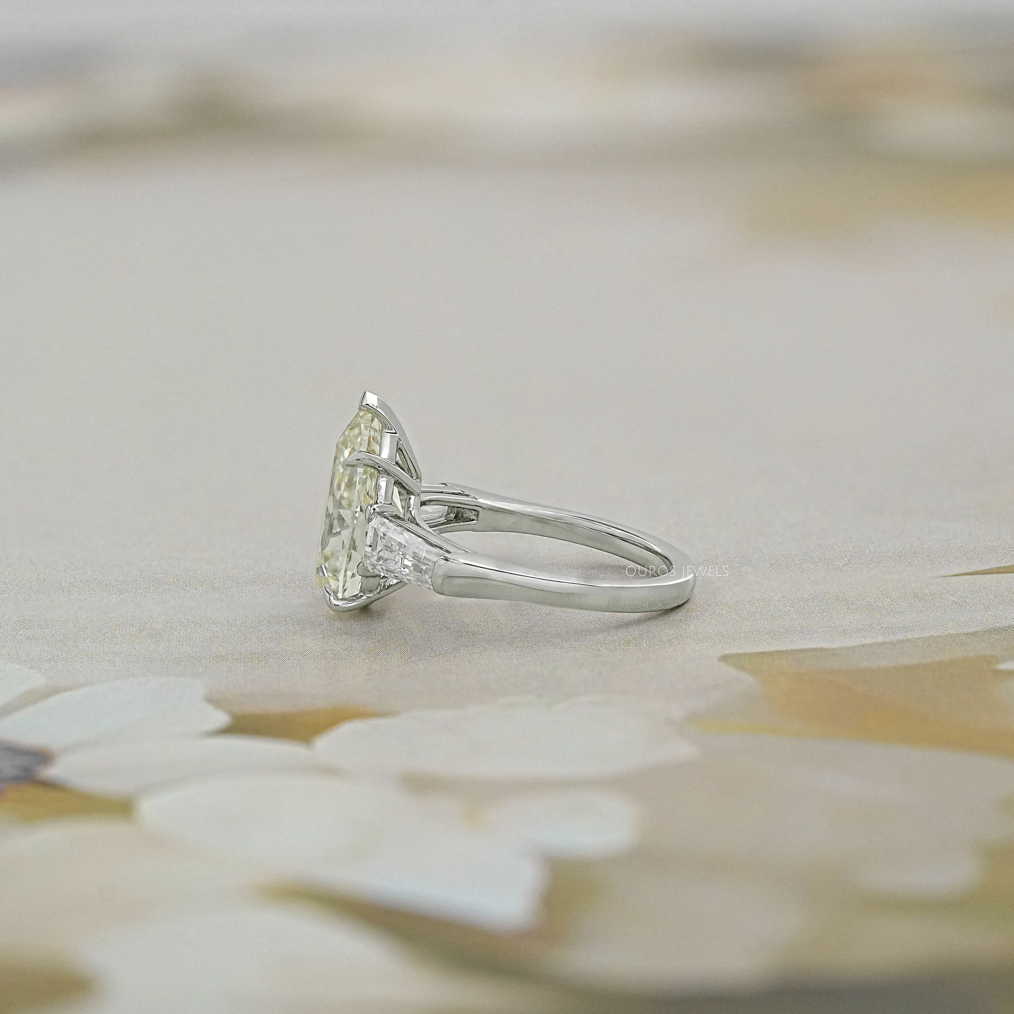 3 Stone Pear and Tapered Baguette Diamond Ring