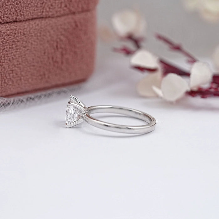 princess cut certified lab diamond engagement ring in model's hand