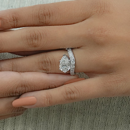 East West Pear Cut Diamond Wave Ring Ring