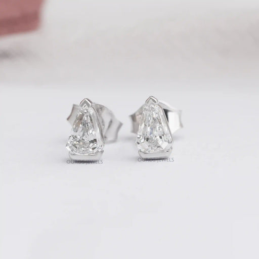 A close-up view of Arrow Cut Stud Diamond Earrings, each featuring a brilliant arrow-shaped diamond 