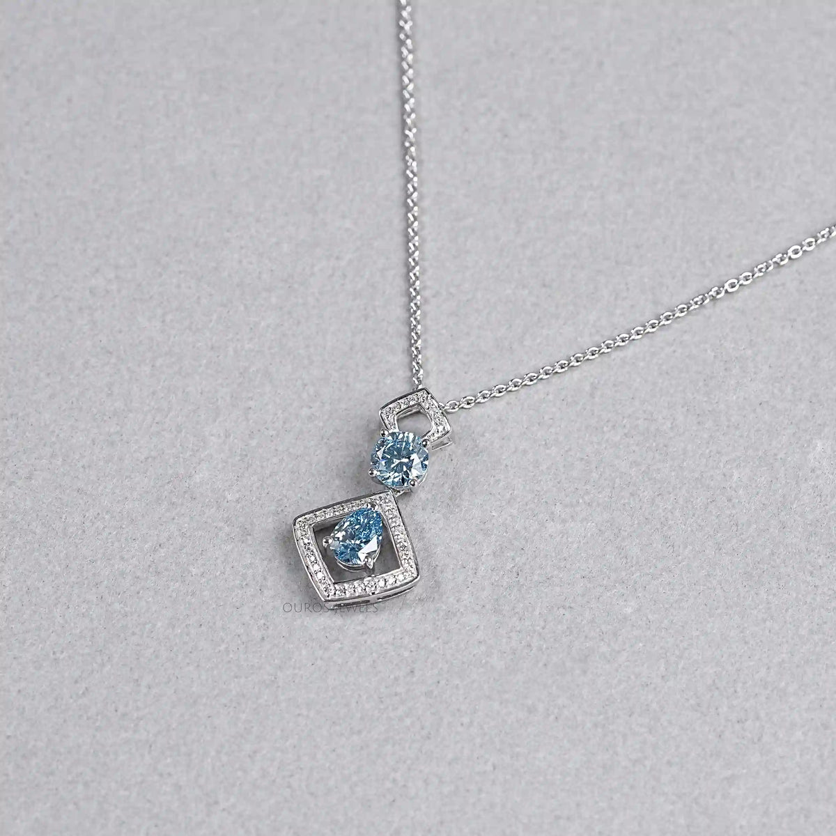 Blue Pear Diamond Halo Floating Pendant Necklaces