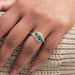 emerald gemstone bypass ring 