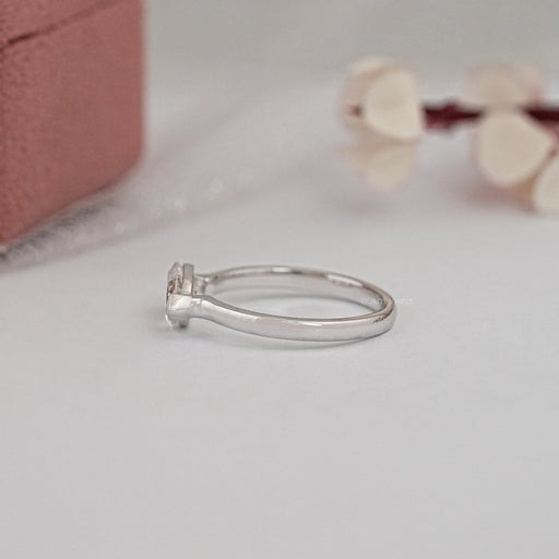 side view of east west set marquise diamond solitaire wedding ring