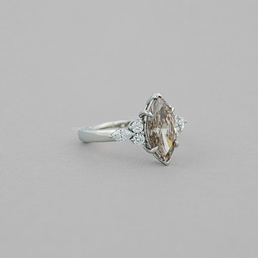 side view of champagne marquise-cut lab diamond solitaire accent wedding ring