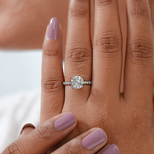 front view of old european round lab diamond solitaire engagement ring in finger