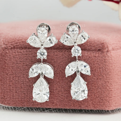 front view of pear cut and marquise lab diamond drop earrings with flat back 