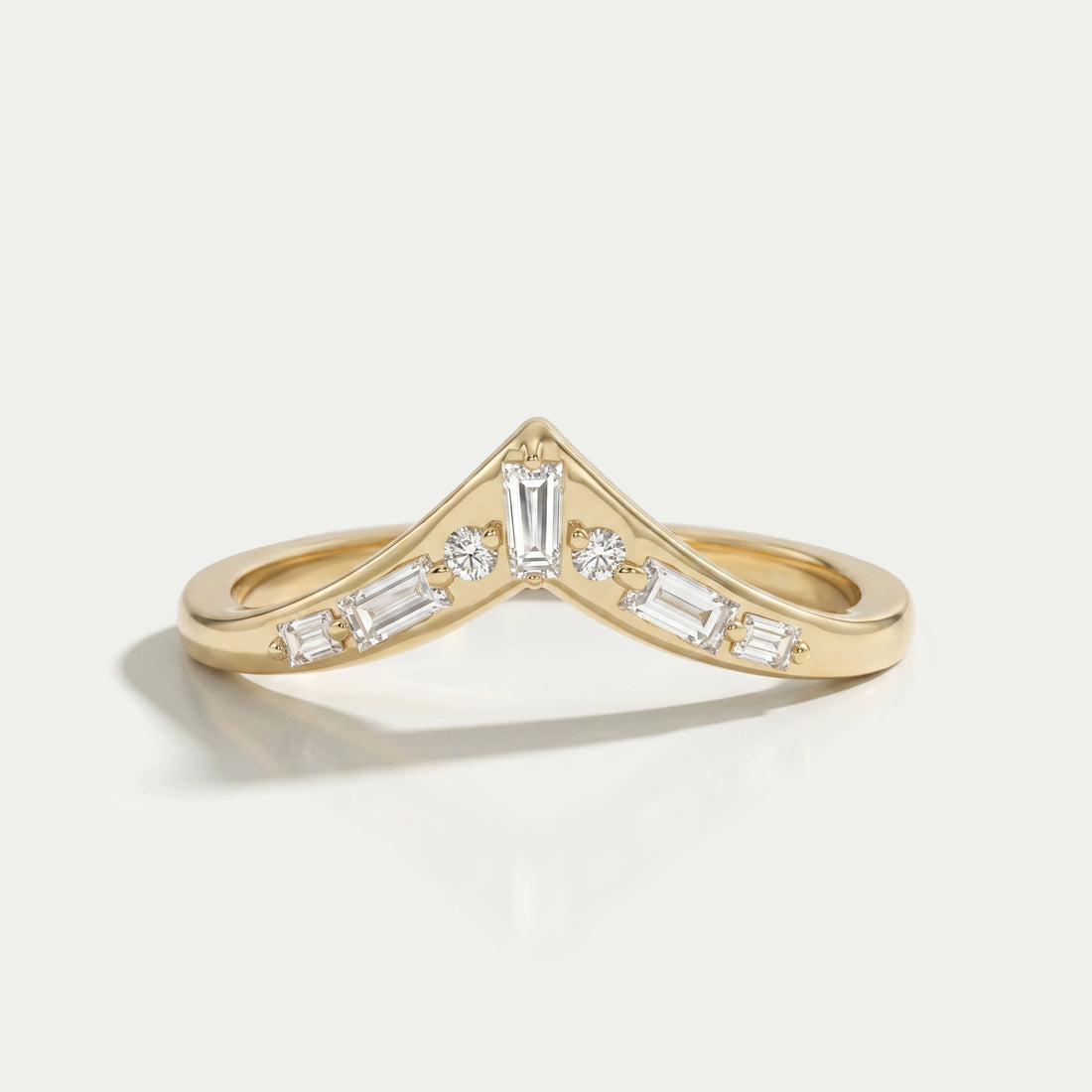 Tappered Baguette And Round Diamond Curved Band Ring