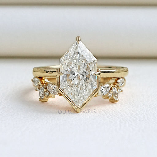 front view of dutch marquise cut diamond wedding ring set with yellow gold band