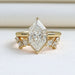 front view of dutch marquise cut diamond wedding ring set with yellow gold band