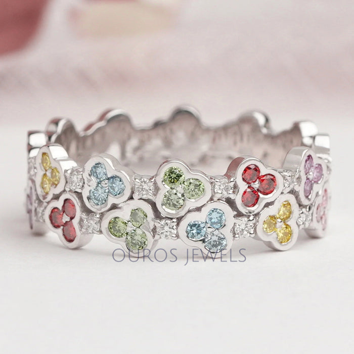 front view of rainbow color round cut lab-grown diamond colored wedding band