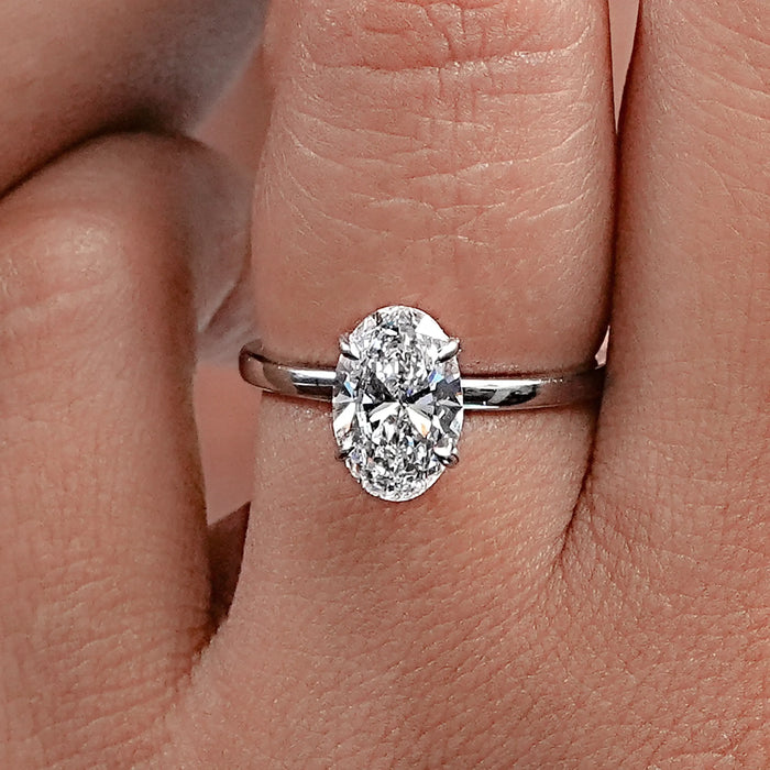 Oval Cut Solitaire Diamond Engagement Ring In Six Prong