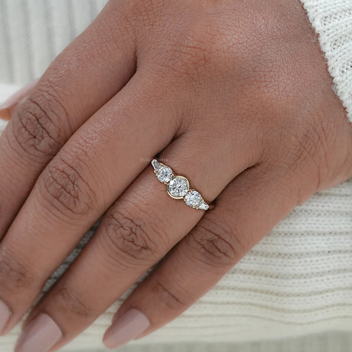 Five Stone Round And Tapered Baguette Cut Engagement Ring