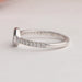 Round accent stone studded on 925 sterling silver shank of octagon diamond engagement ring