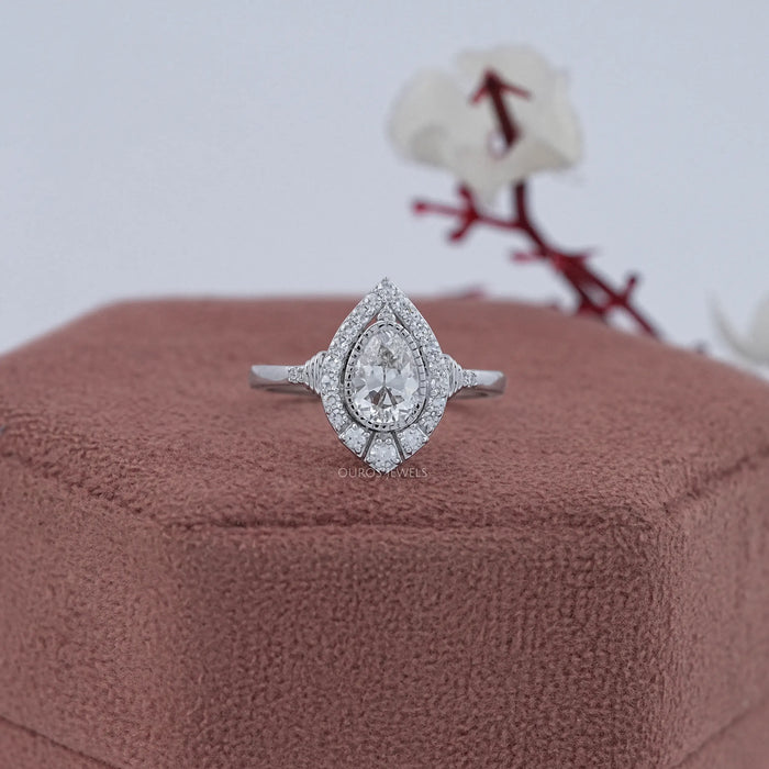 Old Mine Pear Cut  And Single Round Halo Engagement Ring