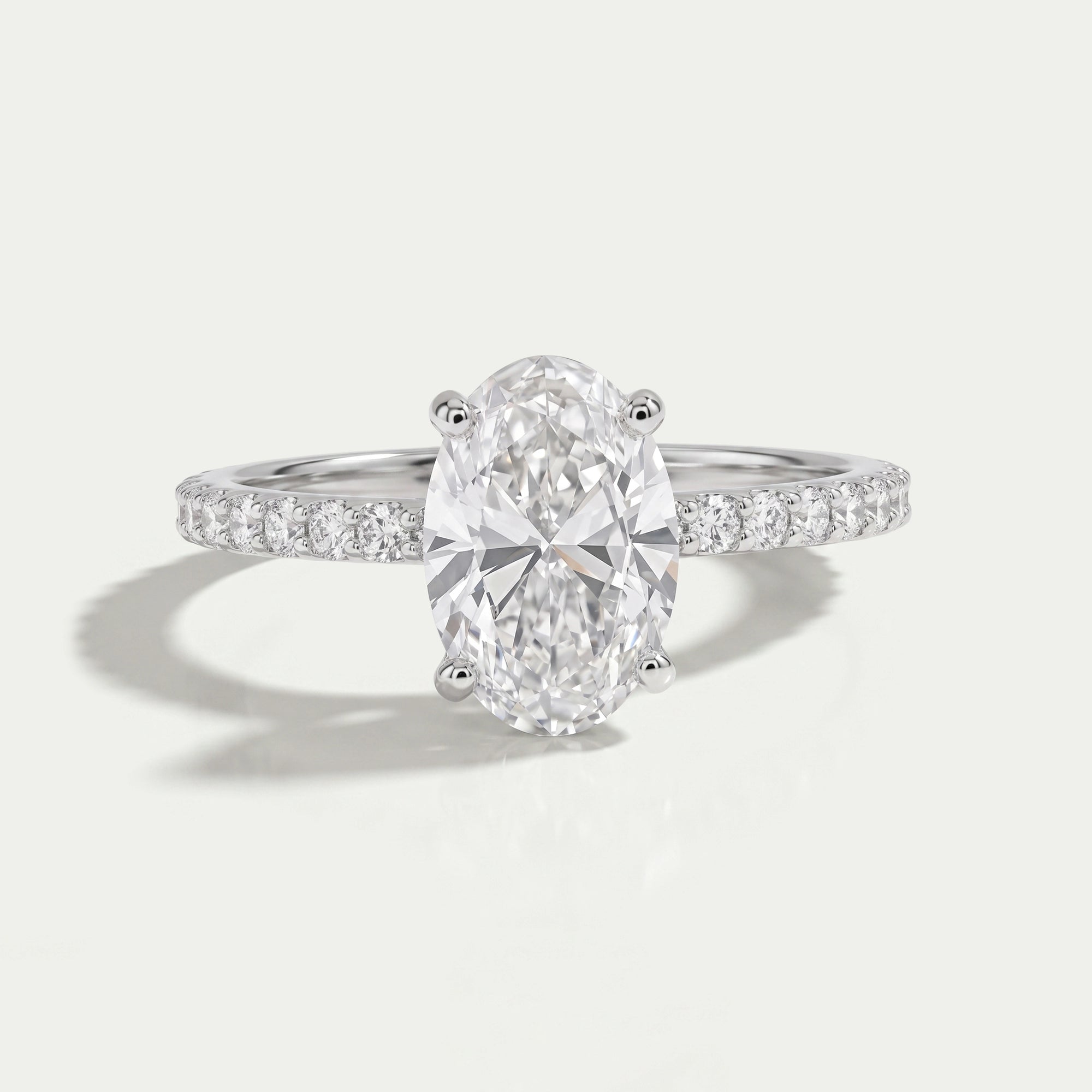 Oval Shape Solitaire With Accent Ring