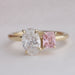 front view of radiant cut gemstone and oval diamond toi et moi engagement ring