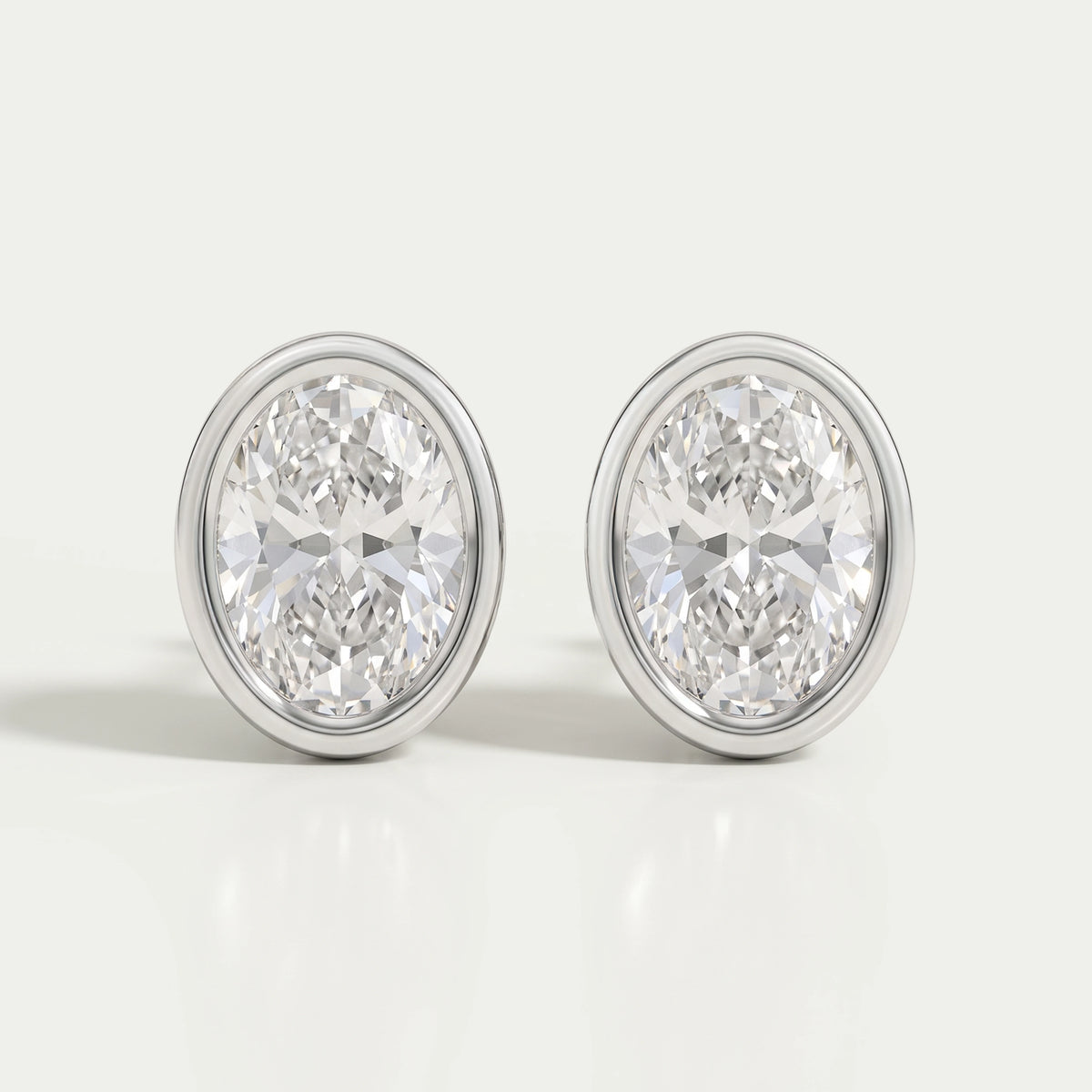 Oval Diamond Bezel Stud Earrings