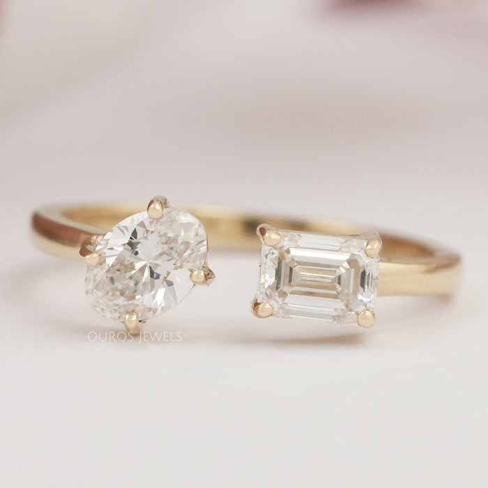 front view of oval and emerald-cut lab diamond toi et moi engagement ring
