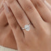 igi certified oval cut diamond solitaire engagement ring on model's hand