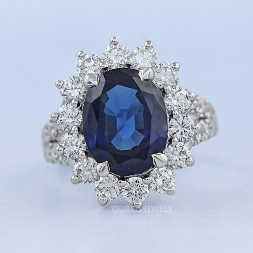 sapphire oval cut gemstone halo split shank engagement ring's front view