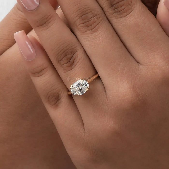 oval cut east west solitaire ring