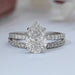 front view of pear-cut diamond solitaire bridal ring set with white gold band