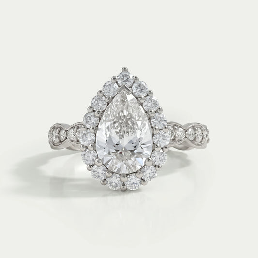 Pear Cut Accent Set Halo Engagement Ring