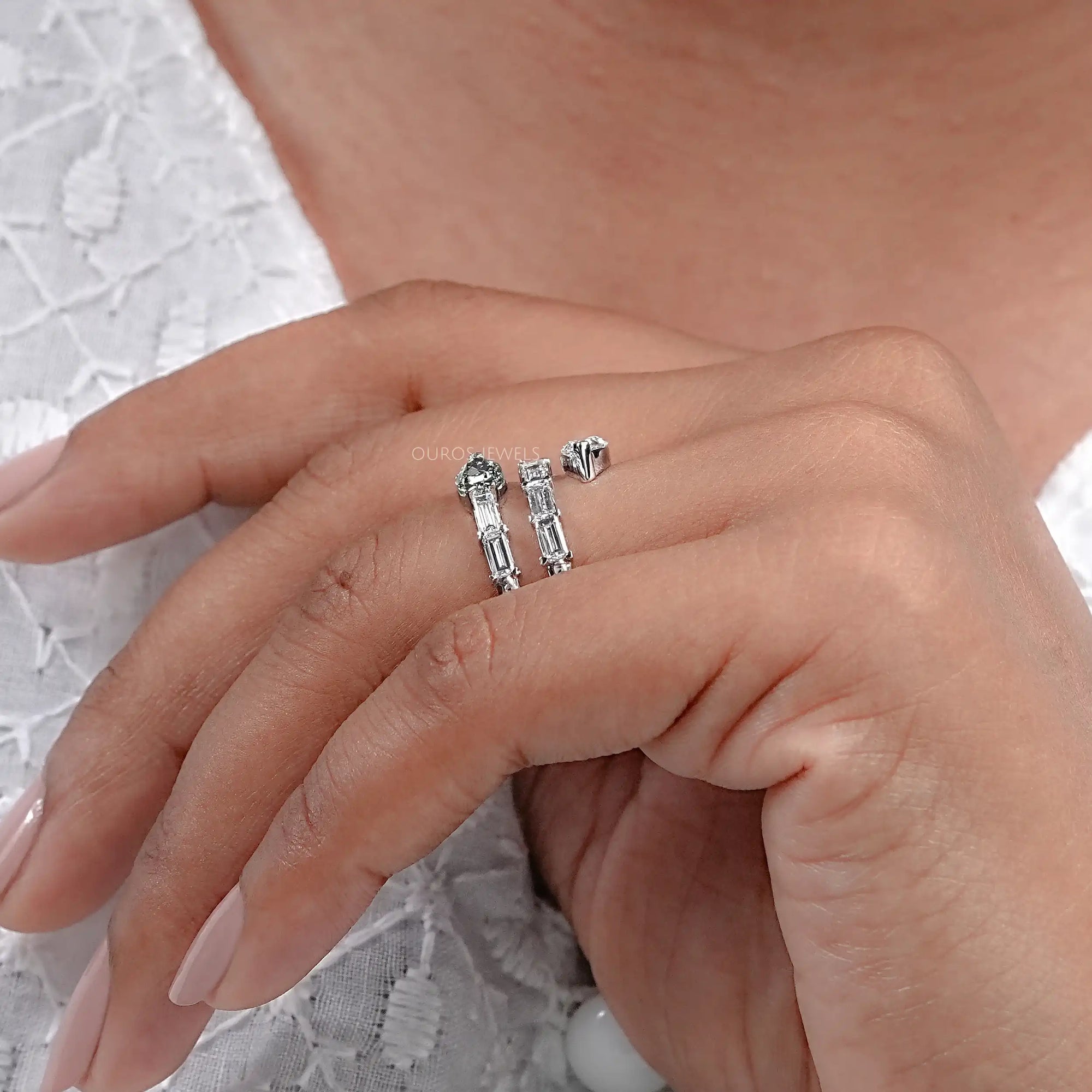 Spiral Shape Baguette And Pear Diamond Ring