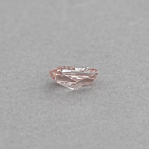 side view of pink loose lab grown elongated cushion cut diamond