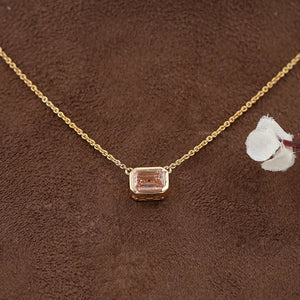 pink emerald bezel set diamond pendant