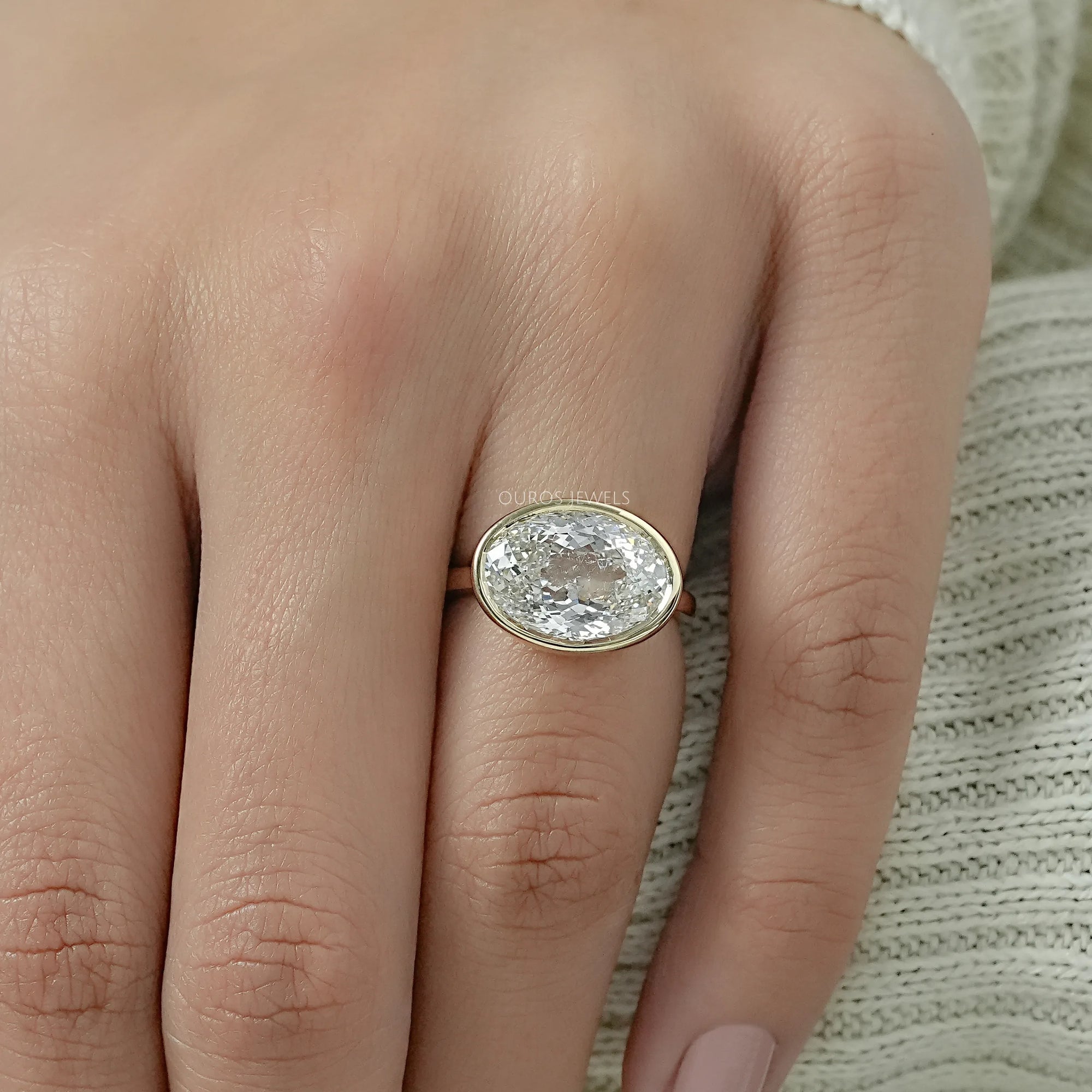 East West Portuguese Oval Bezel Set Engagement Ring Ring