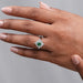 Green cushion gemstone ring