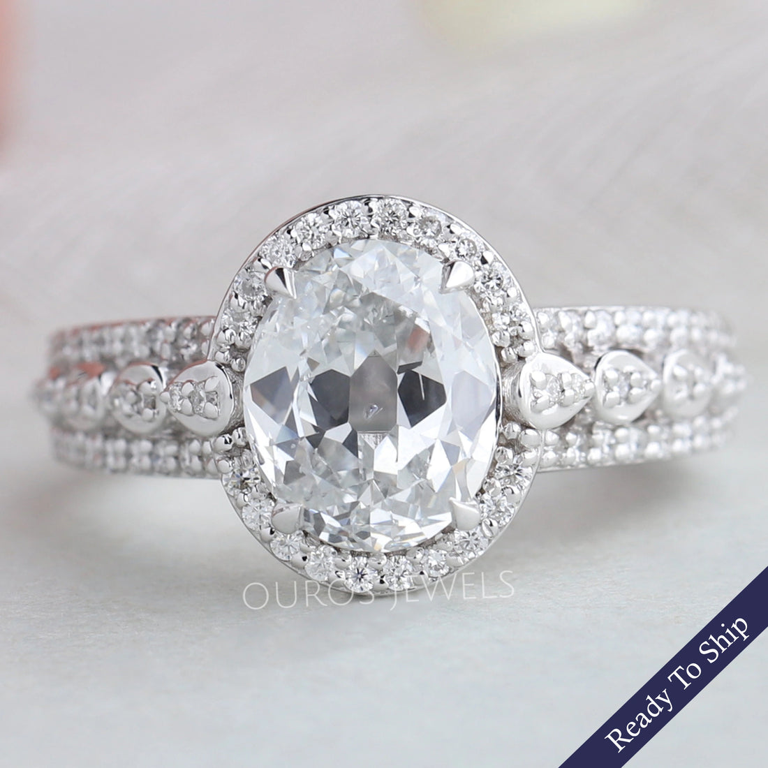Old Mine Oval Cut Halo Diamond Engagement Ring