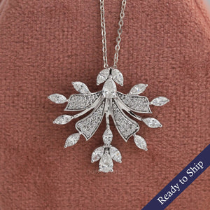 Marquise and round cut lab grown diamond cluster pendant in 14k white gold