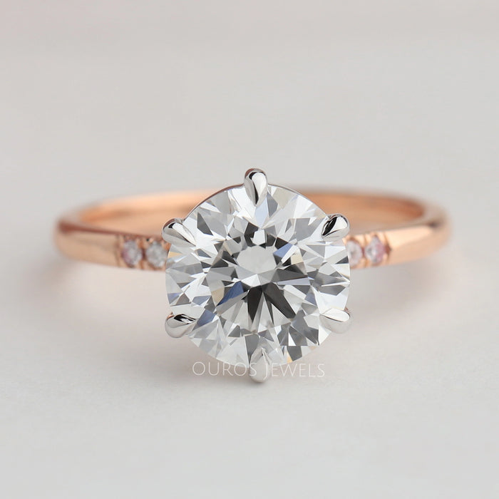 front view of rose-cut round diamond solitaire accent ring with rose gold band