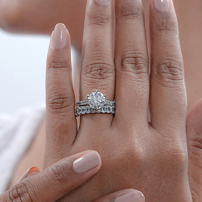 round shape diamond solitaire white gold wedding band set on model's finger