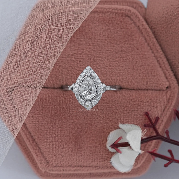 Old Mine Pear Cut  And Single Round Halo Engagement Ring