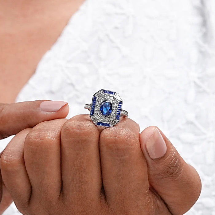 Sapphire Oval And Baguette Diamond Engagement Ring
