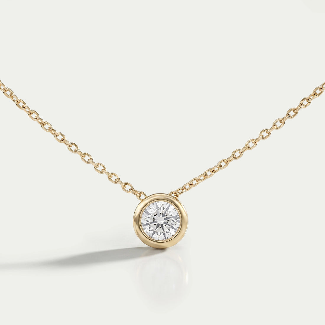 Bezel-Set Round Diamond Solitaire Pendant Necklaces