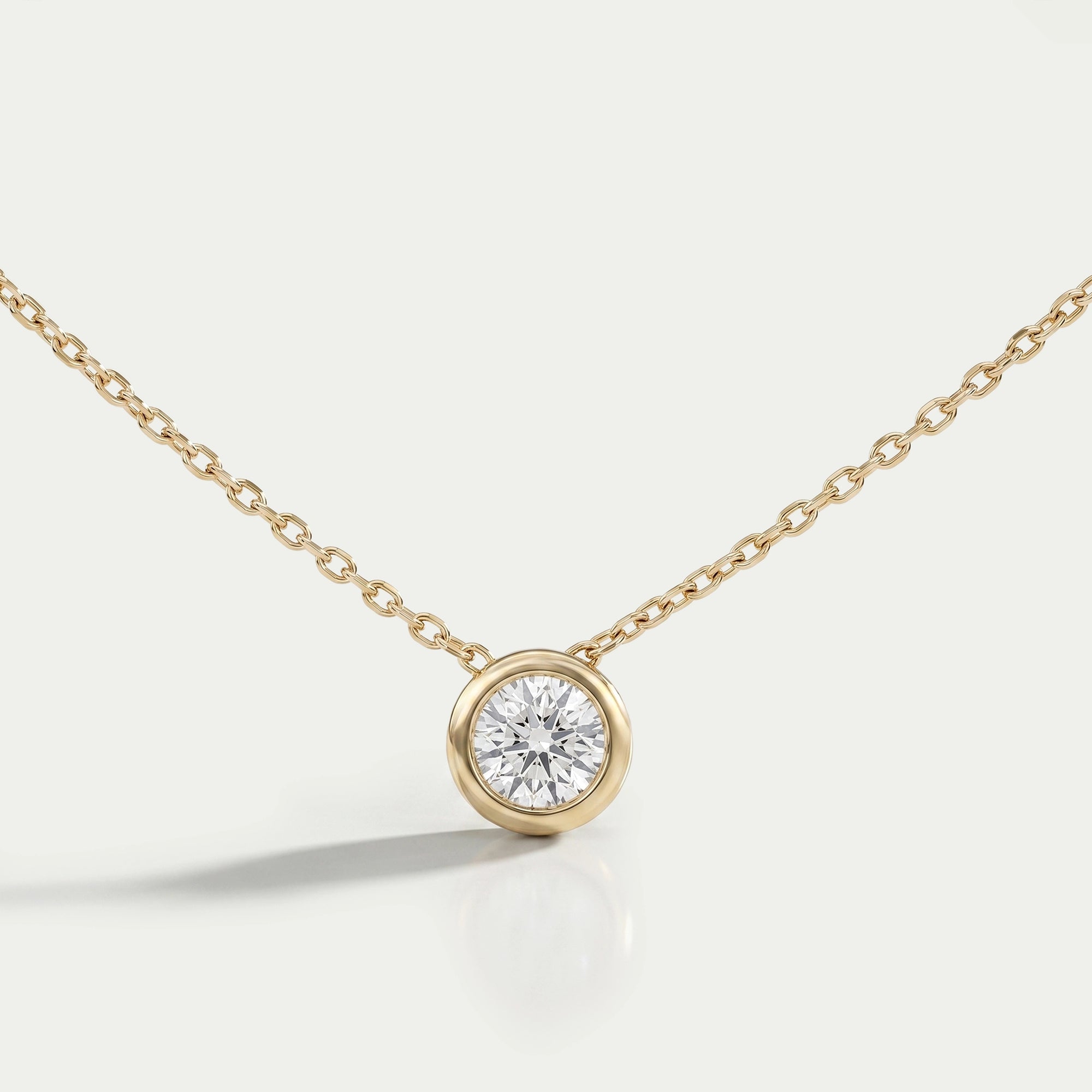 Bezel-Set Round Diamond Solitaire Pendant Necklaces