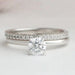 front view of round-cut lab-grown diamond bridal ring set with white gold band