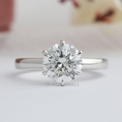 top view of six prong round cut lab diamond solitaire engagement ring