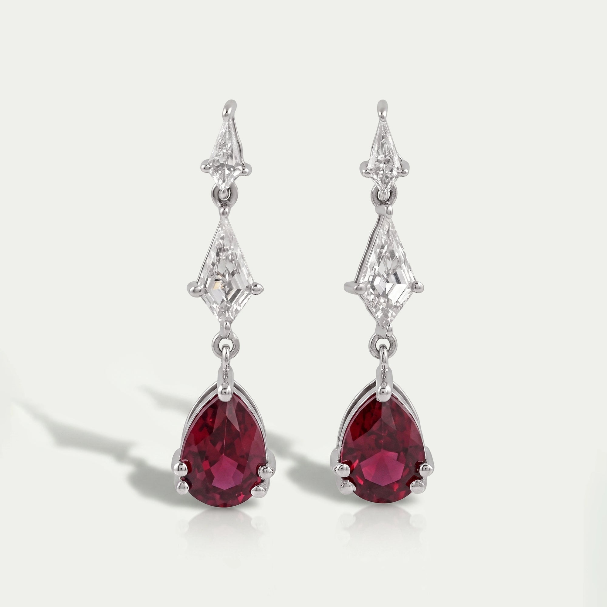 Dangling Kite Cut And Pear Shape Ruby Drop Earrings