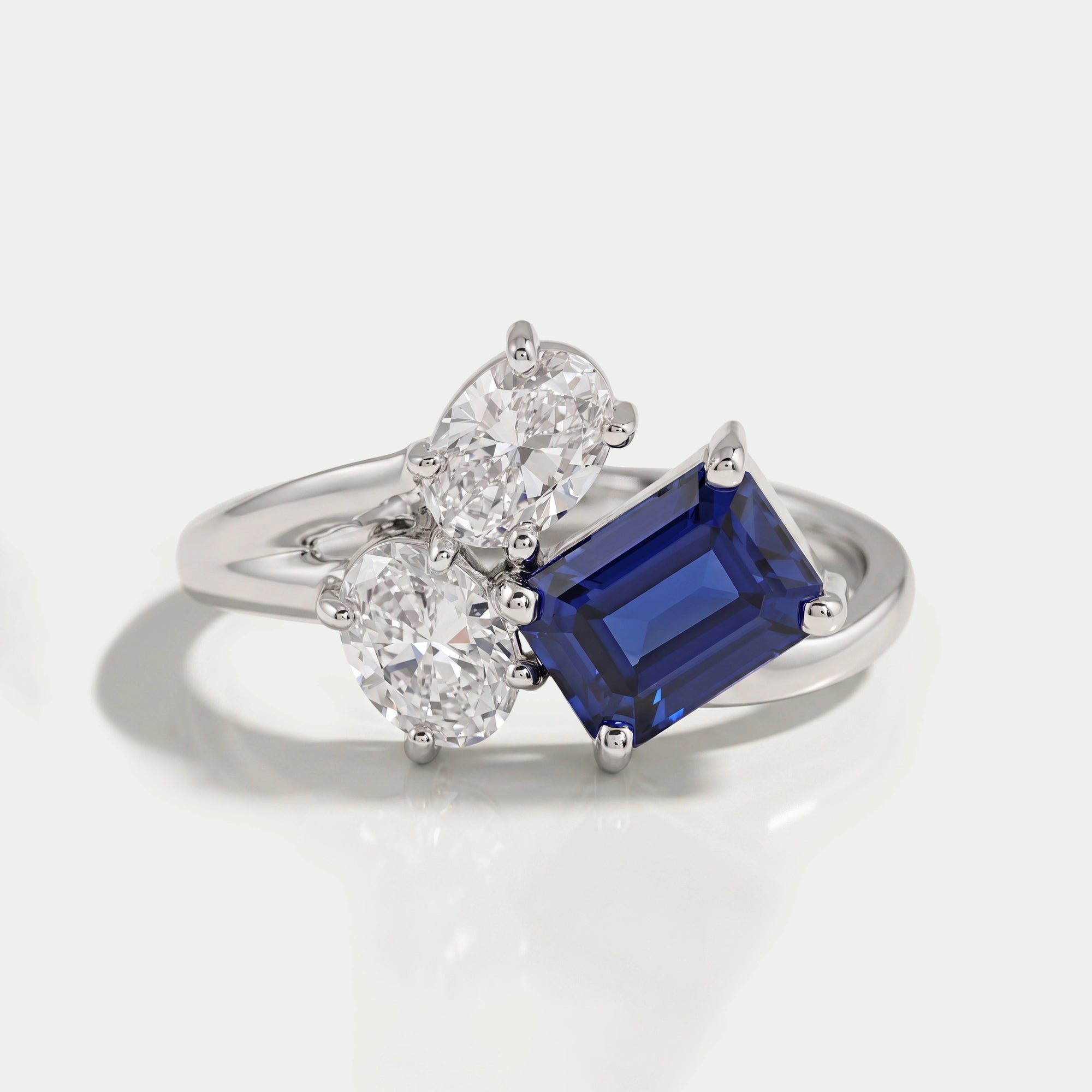 Sapphire Emerald And Oval Cut Split Shank Ring