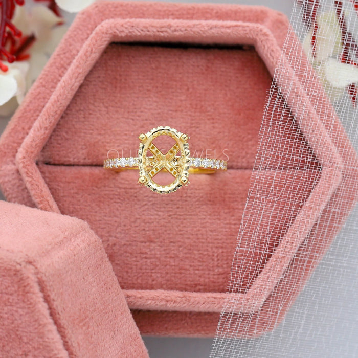 solitaire accent oval-shaped semi-mount engagement ring in jewelry box