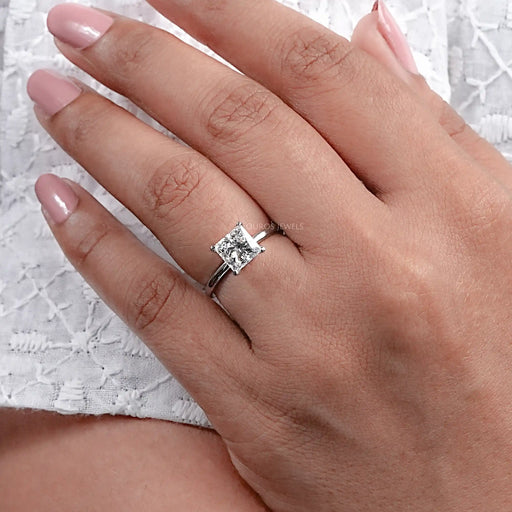 square radiant cut lab diamond solitaire engagement ring on hand