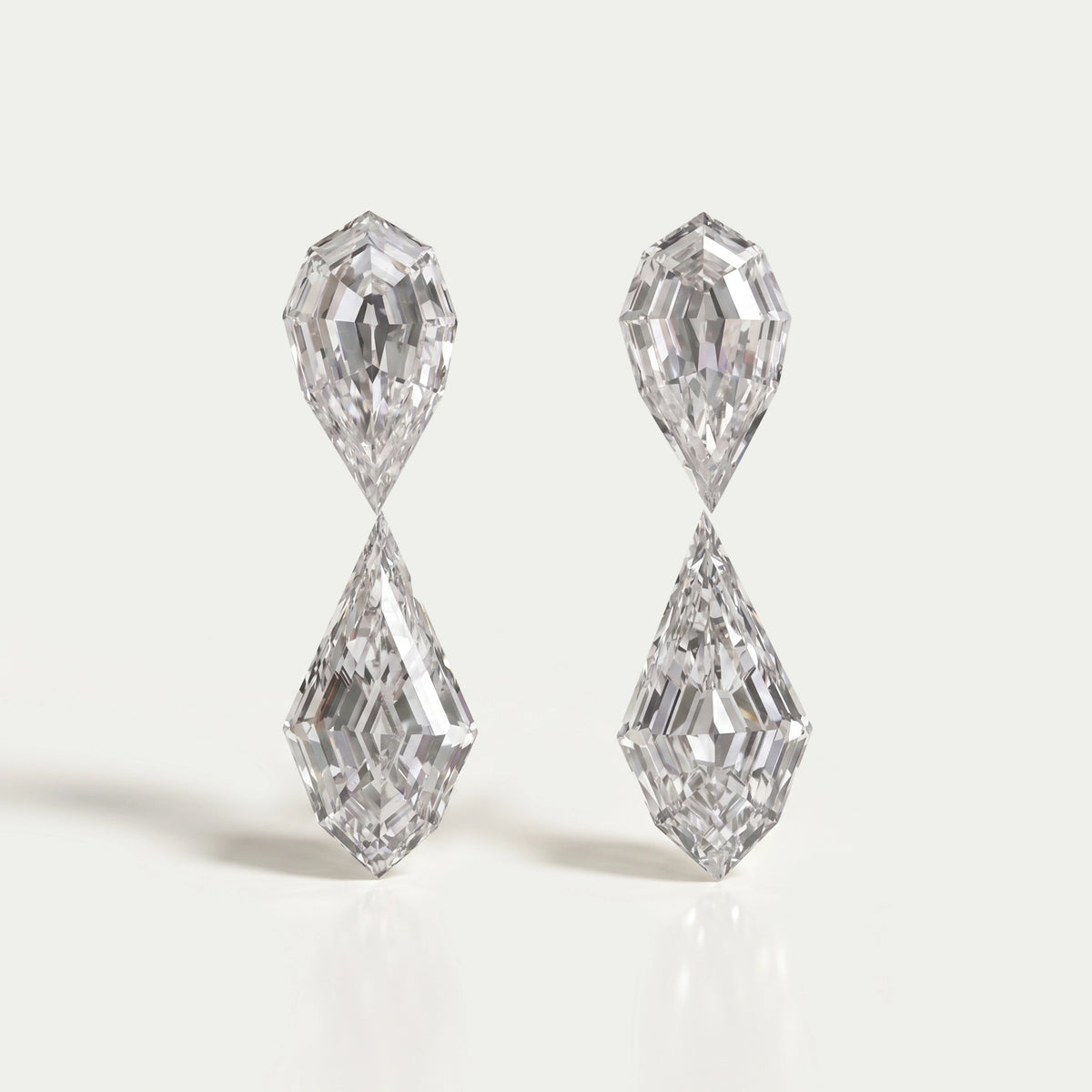 4.15 TCW Step Cut Pear And Kite Diamond Loose Pair