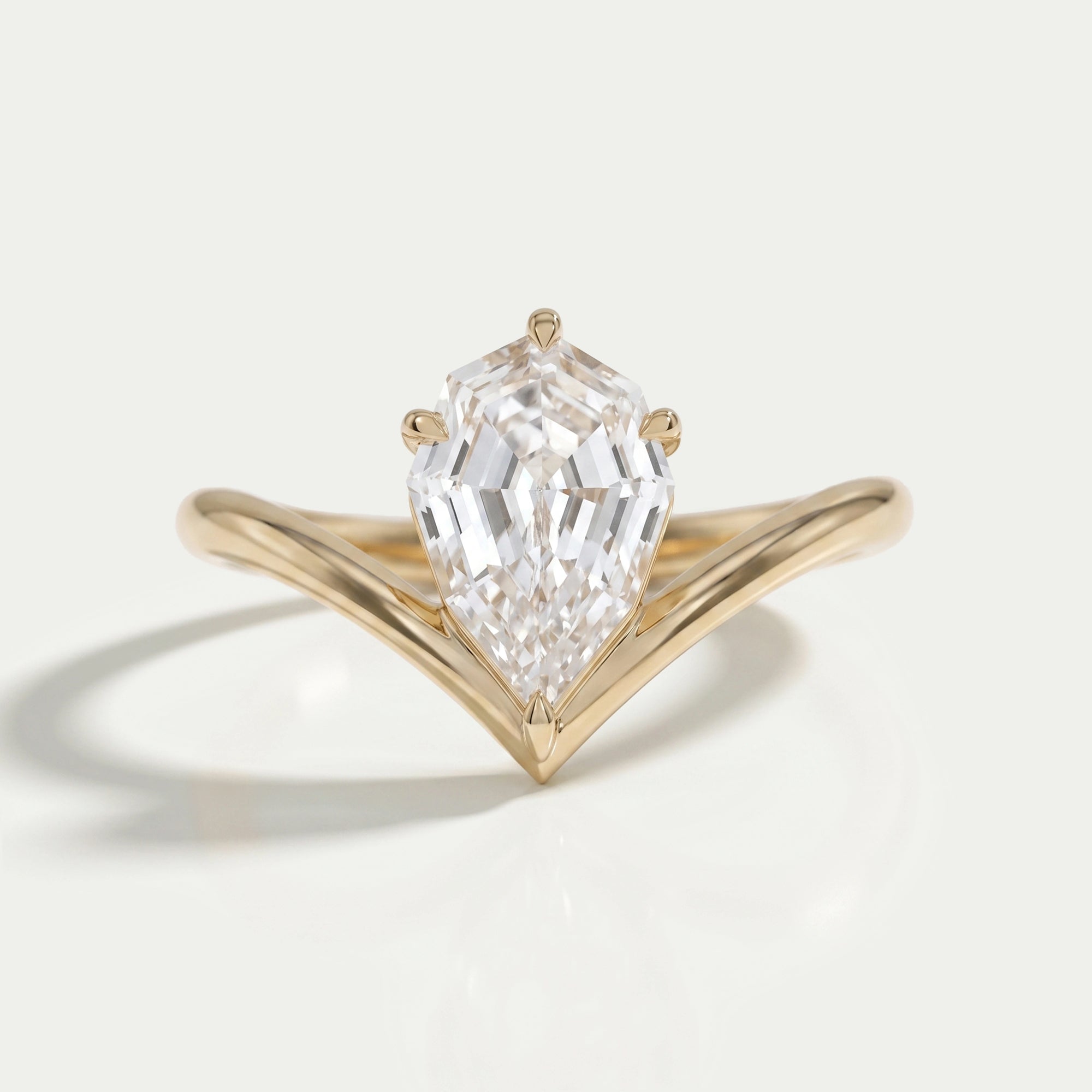 Step Cut Pear Cut Curved Solitaire Engagement Ring