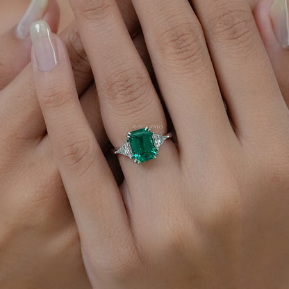 Emerald And Triangle Cut Trio Engagement Ring