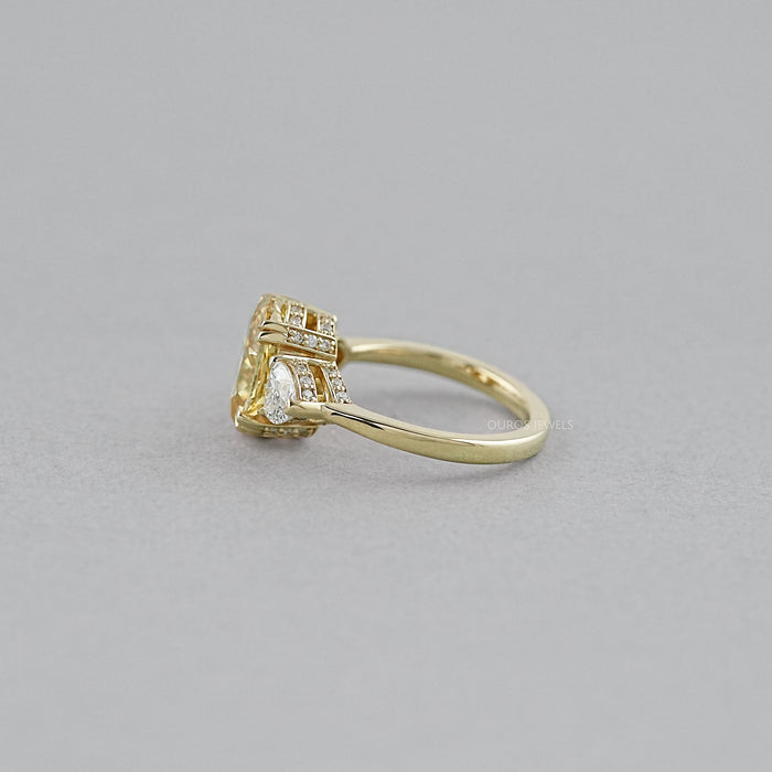 Fancy Vivid Yellow Oval Cut Hidden Halo Three Stone Ring